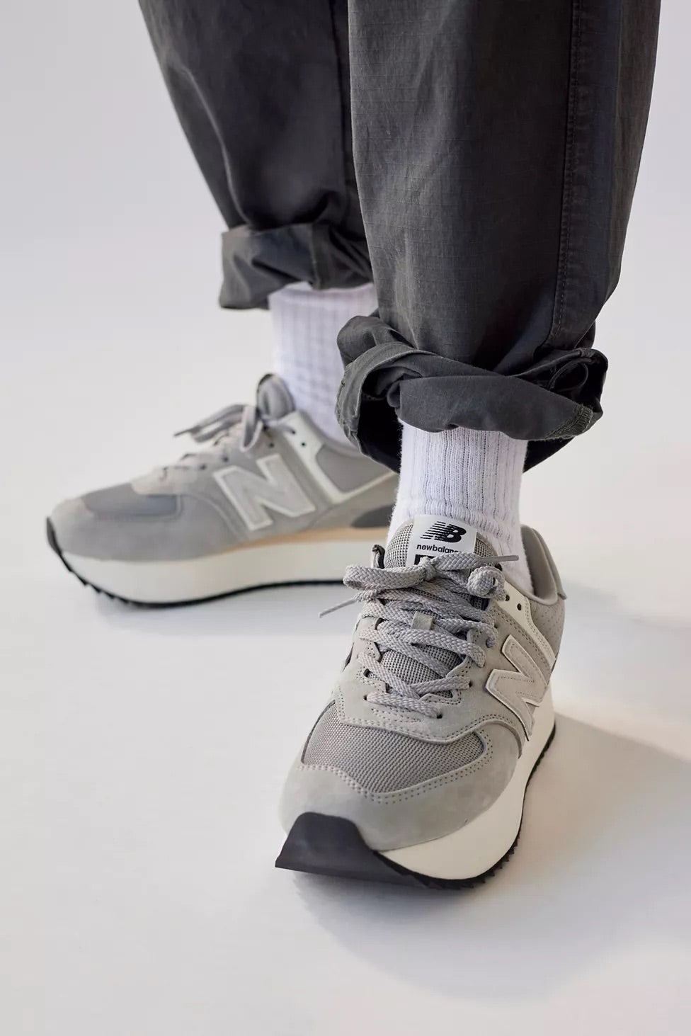 
                  
                    New Balance Women 574+ Platform Sneaker
                  
                